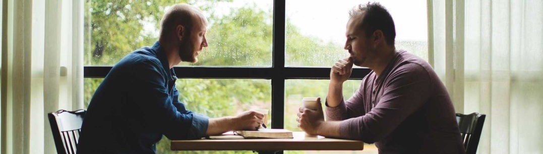 1men-talking-bible-table-1080x675-